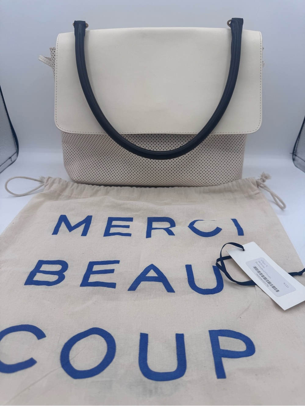 Clare V Helene Cream Perf Handbag cream with black strap. Messenger style.